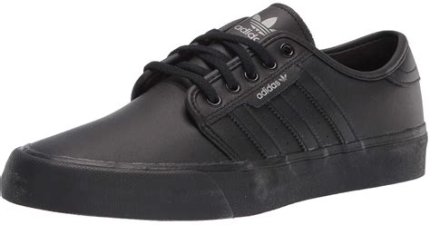 adidas zwart blauw seeley|adidas Originals Seeley XT sneakers in black .